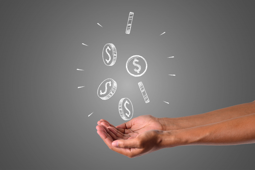 AAA Service Network team members’ hands joined, with dollar sign coins above, symbolizing our support for your energy bills.